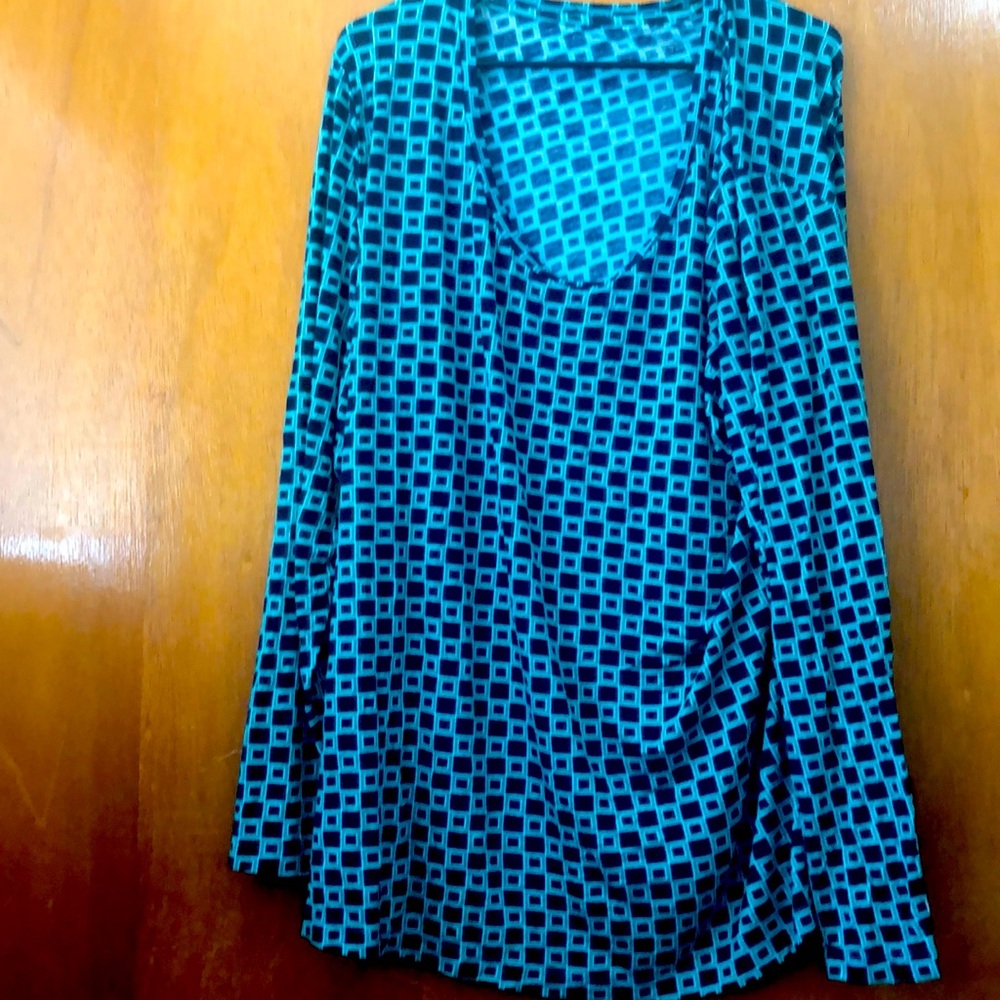 Dimensional shirt size 28 teal and black.